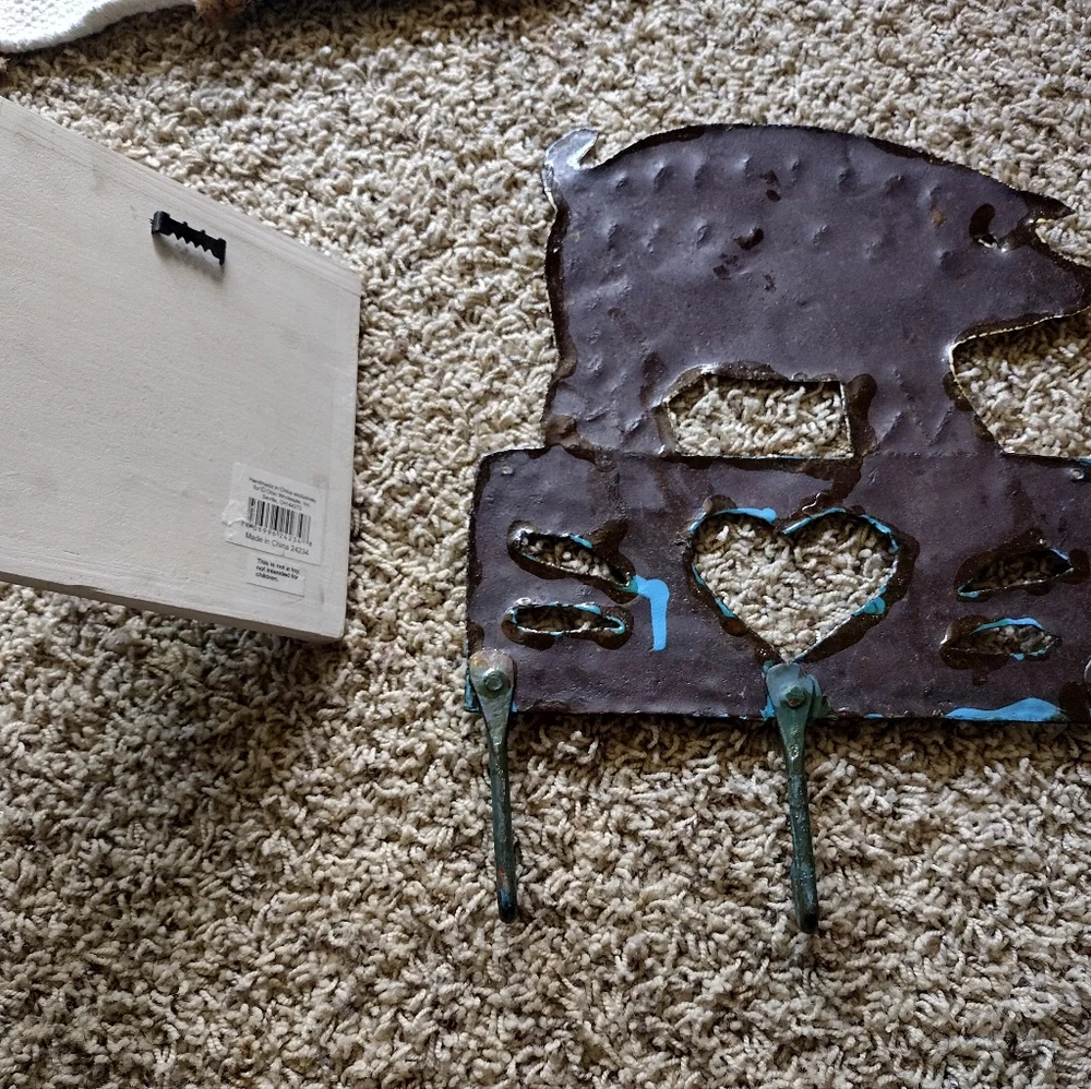 3 /$25 Two decorative wall coat hangers